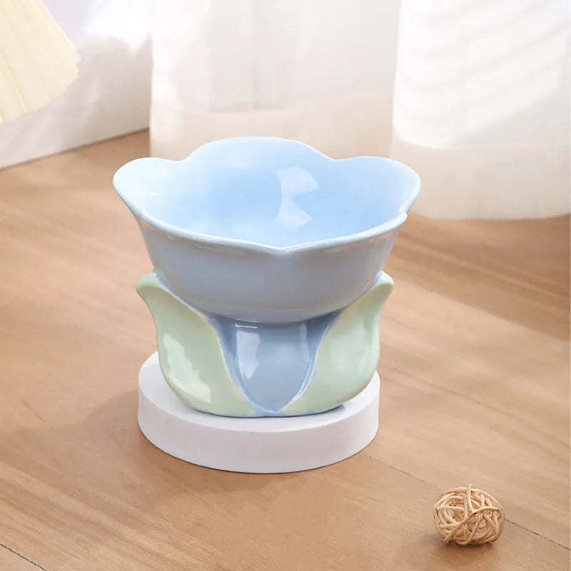 Blue floral patterned ceramic pet bowl with elevated design and non-slip base for cats and small dogs