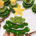 Green handmade woolen pet Christmas hat on a small dog with ins style