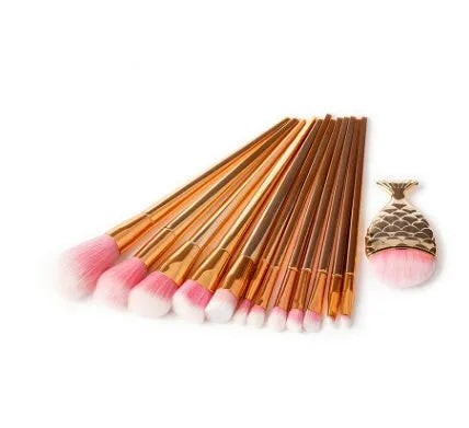 12 piece makeup brush set with nylon bristles, plastic long rod handles, mermaid and diamond design in rose gold