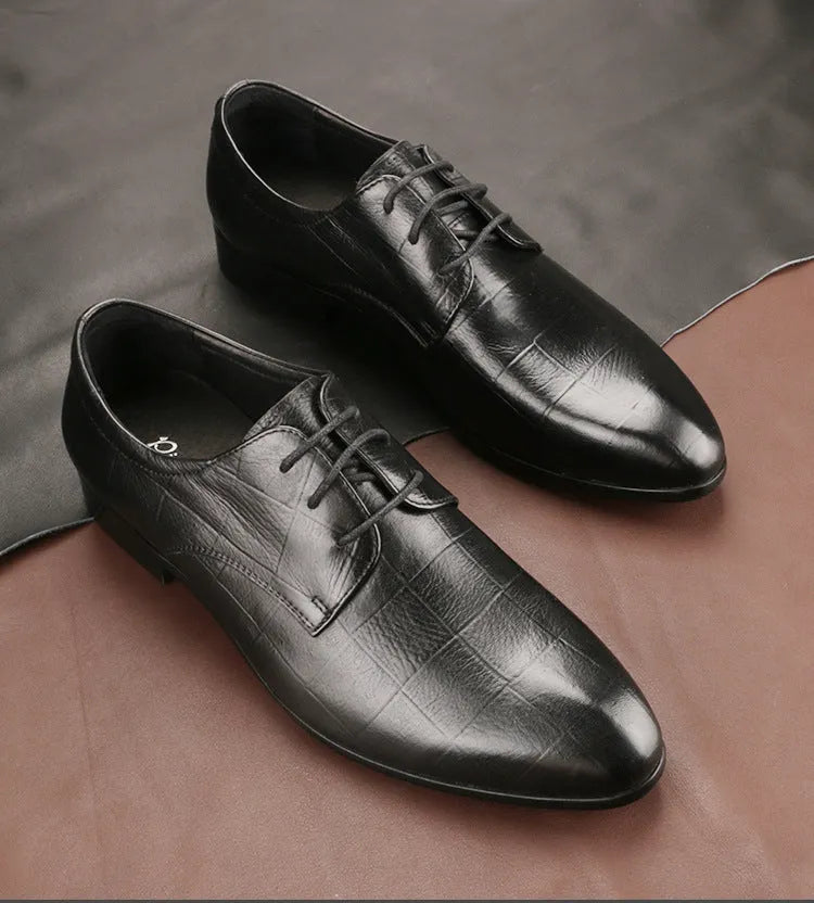 Men's black leather derby shoes with pointed toe and checkered stitching detail