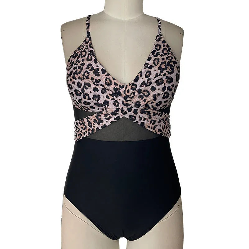 Women's black mesh spliced backless one-piece swimsuit on model