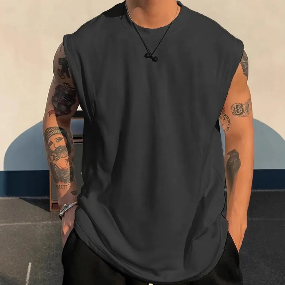 Men's loose fit sleeveless cotton tank top in solid colour on a hanger