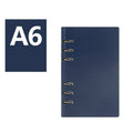Simple business notebook with imitation leather cover showing loose-leaf binding and beige road forest paper