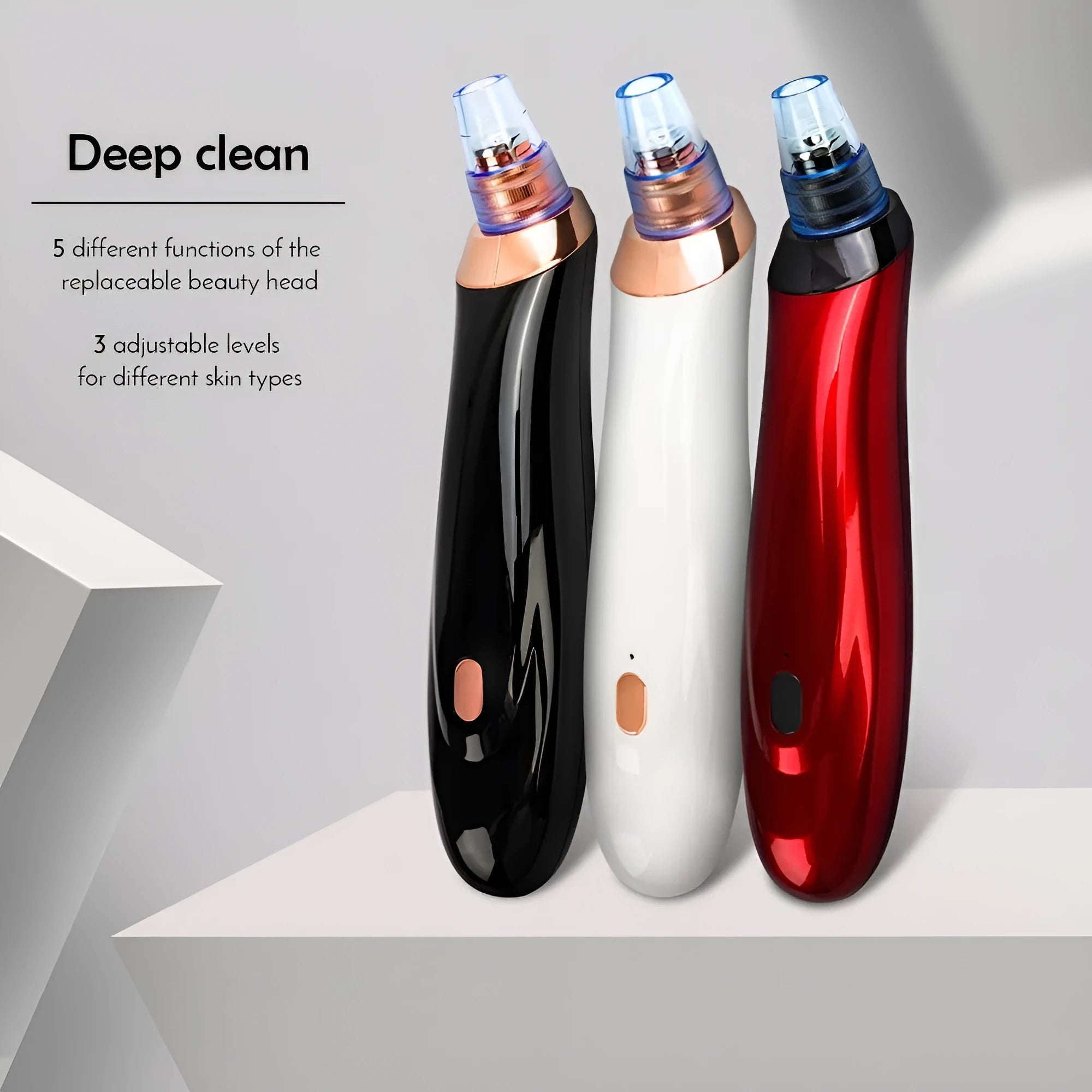 Electric blackhead remover pore cleaner in black with interchangeable nozzle heads and compact design