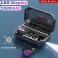 Black and white wireless Bluetooth headset with charging cabin showing LED power display