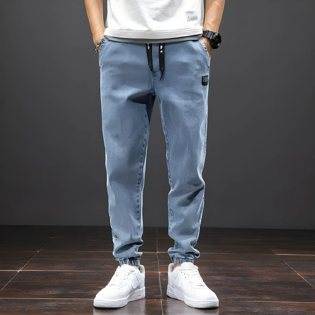 Men's cropped oversized slimming straight leg jeans in black, grey, and blue with high elasticity cotton blend