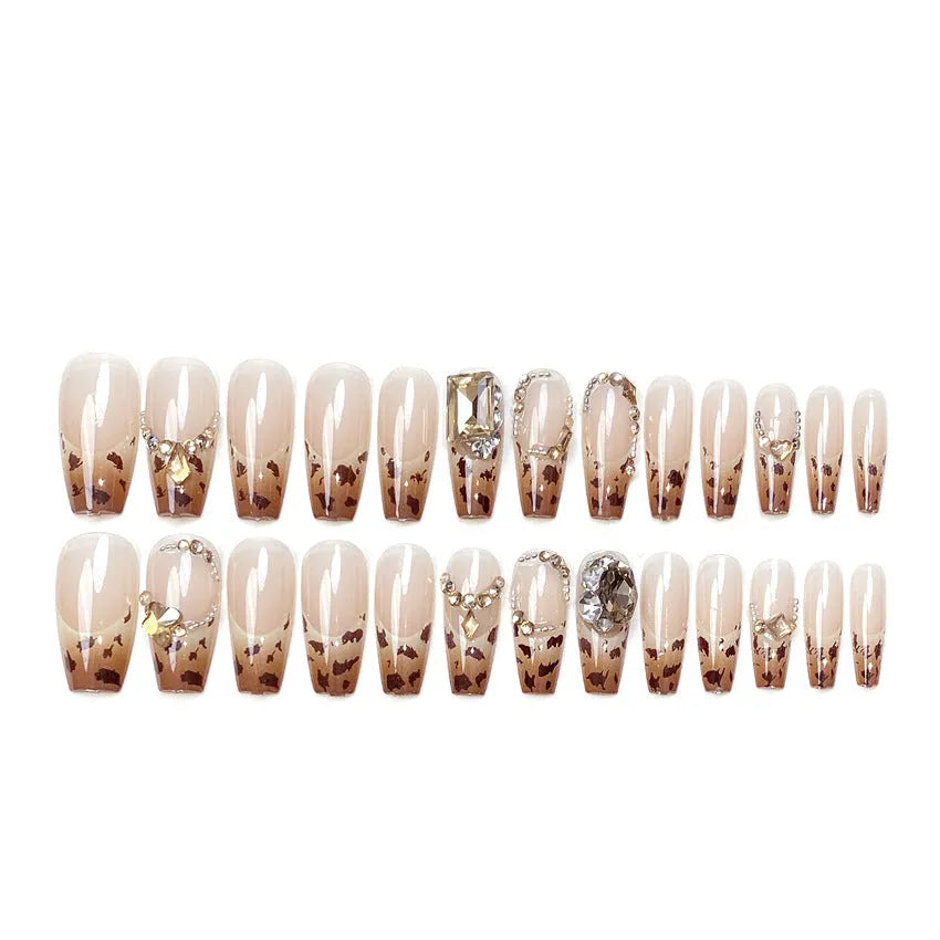 Leopard print plastic wearable nail armour set with advanced flash finish on women's hands