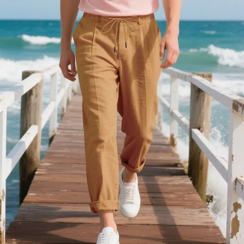Men's linen trousers with drawstring waist in straight leg design showing army green colour option