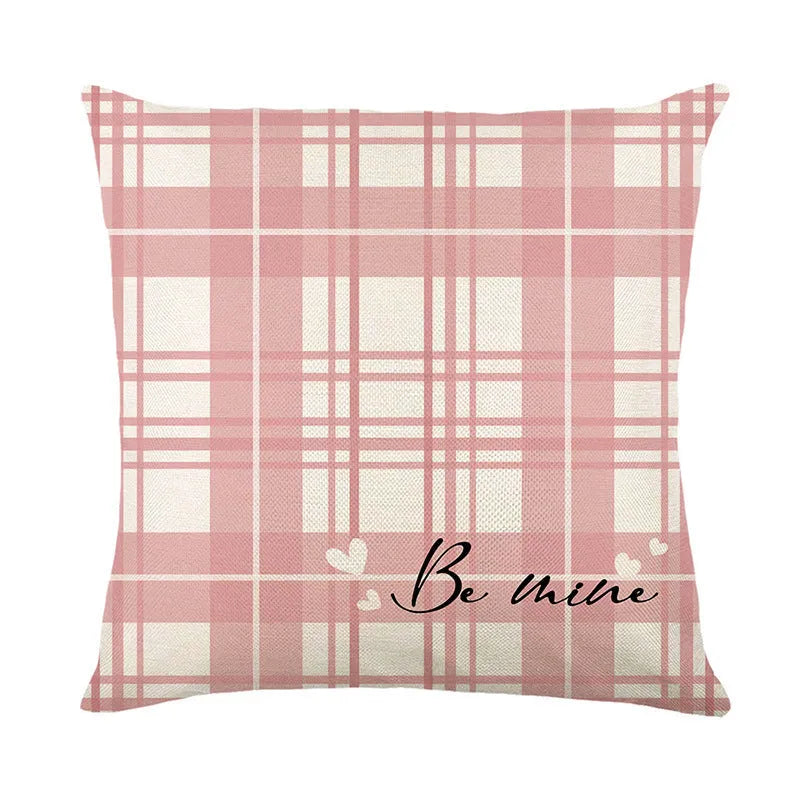 Square pillow cover with red and white plaid heart pattern for Valentine's Day decoration.
