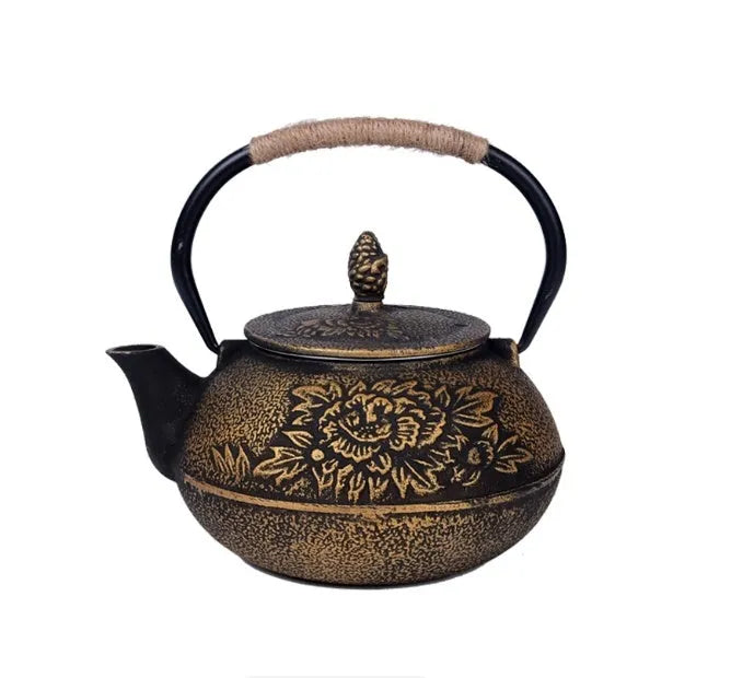 Japanese-style cast iron teapot with traditional decorative patterns and 0.9 litre capacity