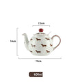Ceramic sausage dog teapot mug cup and saucer three-piece set on table
