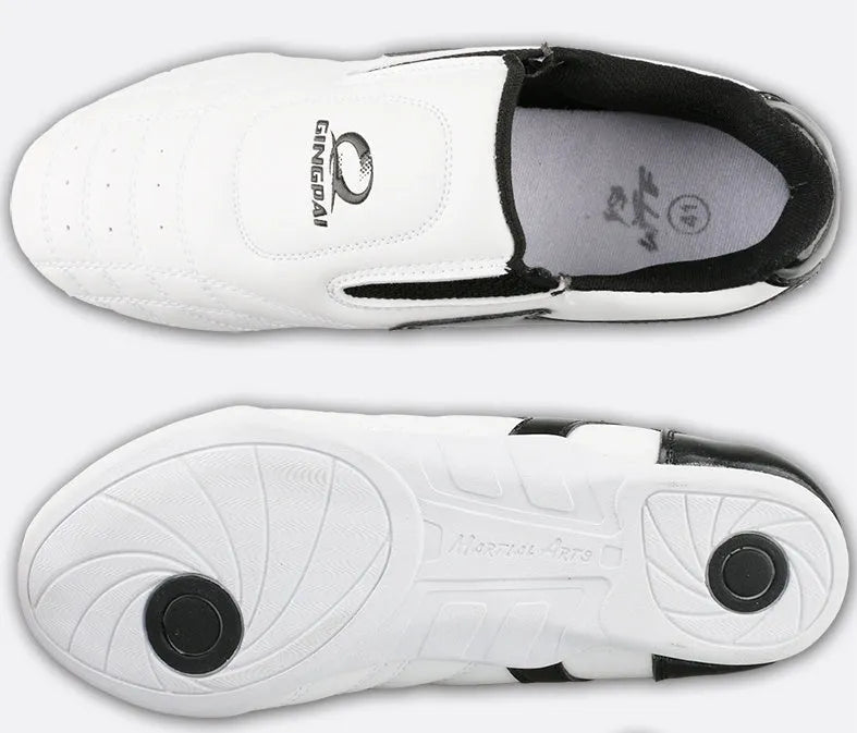 Black and white PU Taekwondo martial arts training shoes with a soft sole.