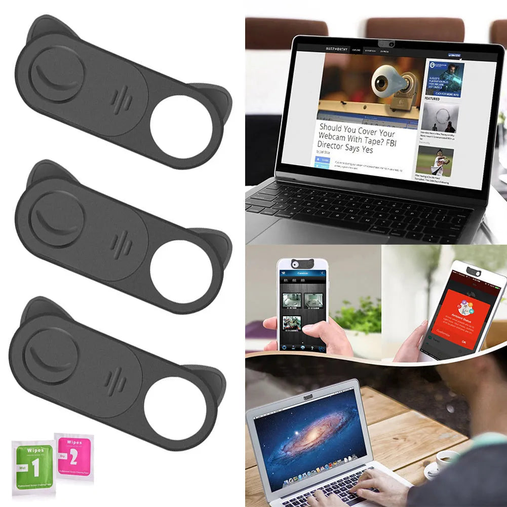 Black plastic sliding webcam privacy cover 18 x 9 mm placed over laptop camera lens
