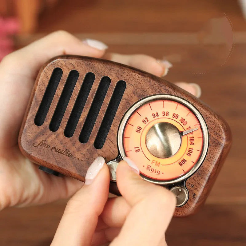 Retro wooden wireless mini speaker in cherry wood or walnut finish with Bluetooth connectivity