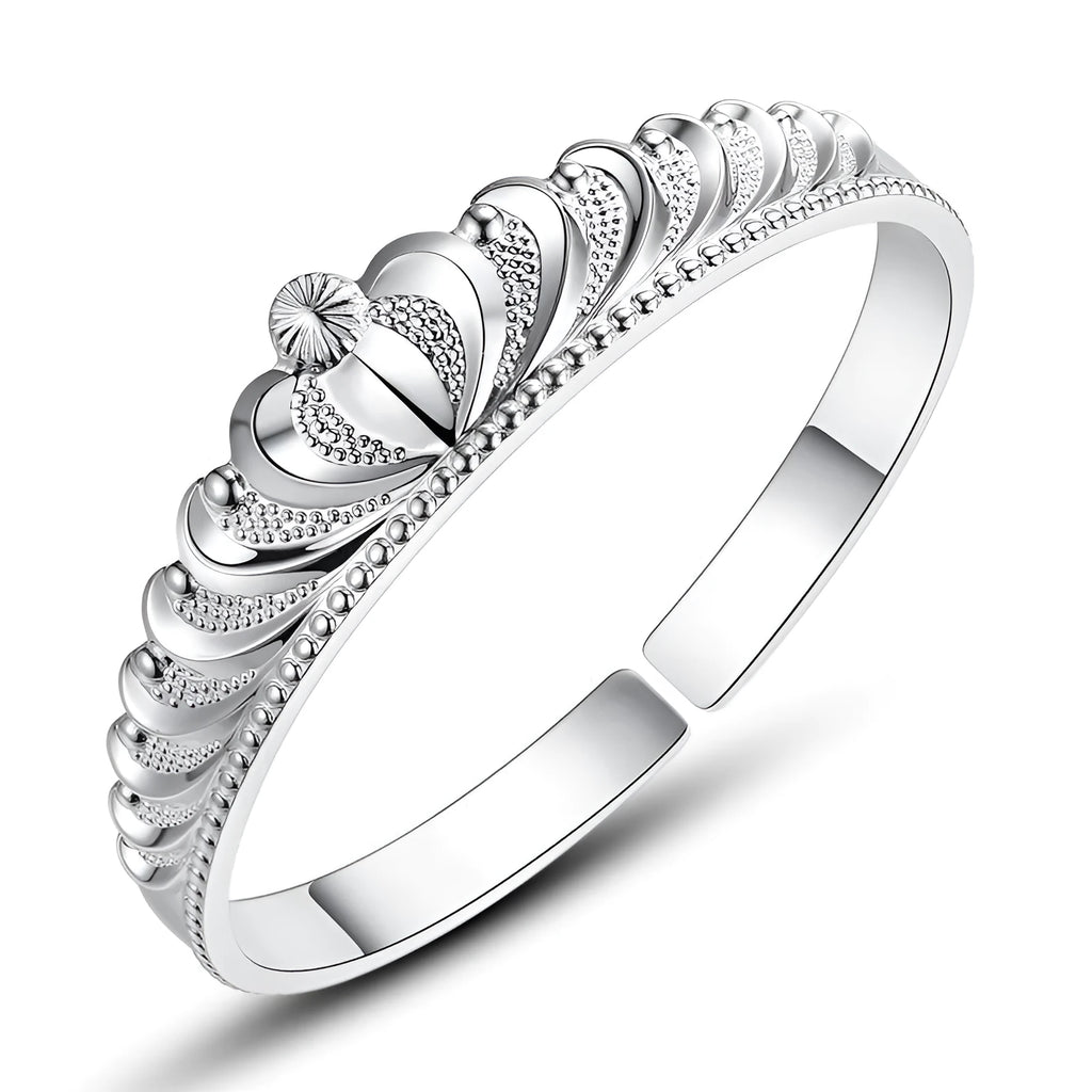 Silver electroplated crown bracelet for women on white background