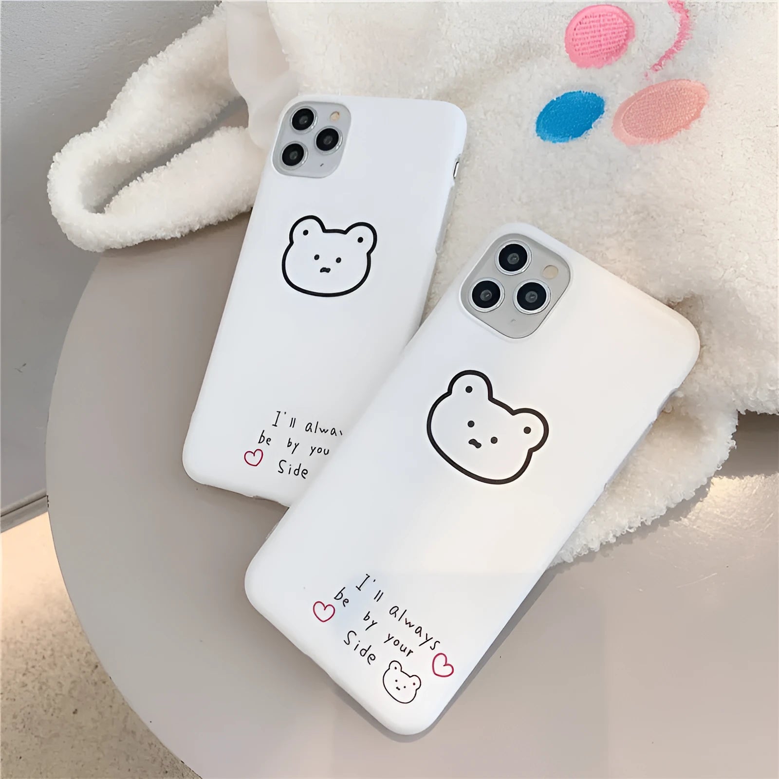 Soft silicone mobile phone case for iPhone with a cartoon Korean bear design on the back.