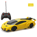 Remote control wall climbing car in red with industrial fan vents and white adsorbent strip on bottom, 1/28 scale
