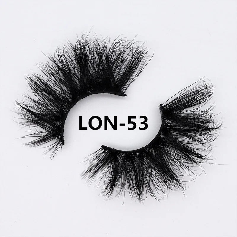 25MM3D handmade mink eyelashes in a clear plastic tray showing 25mm length 3D curl design