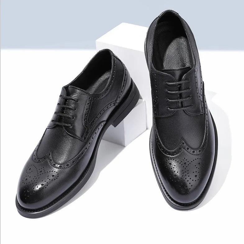 Men's black and brown brogue formal shoes with wingtip perforations, shown on a plain background.
