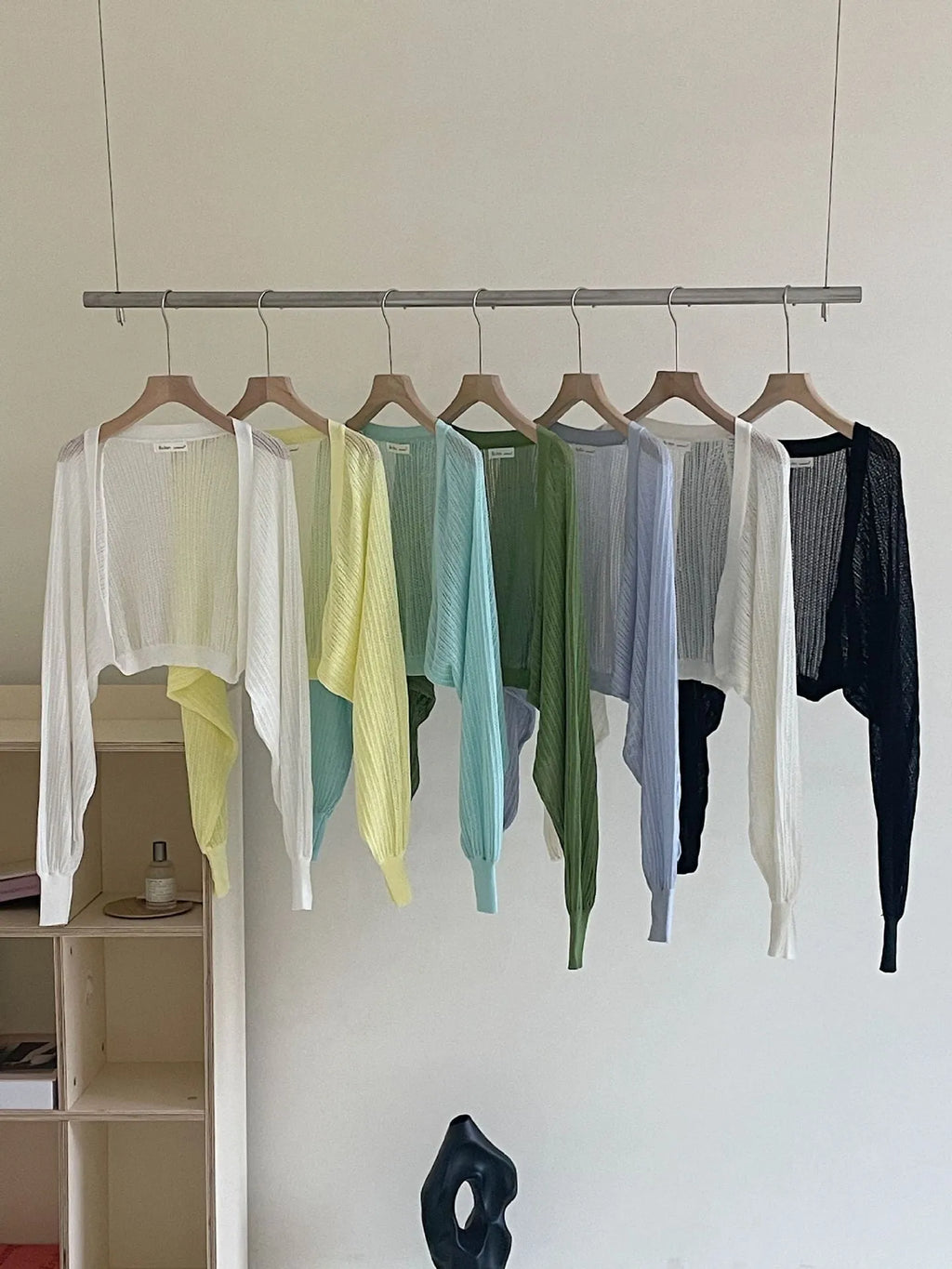 Women's linen blouse with hollow-out design and long lantern sleeves in apricot colour
