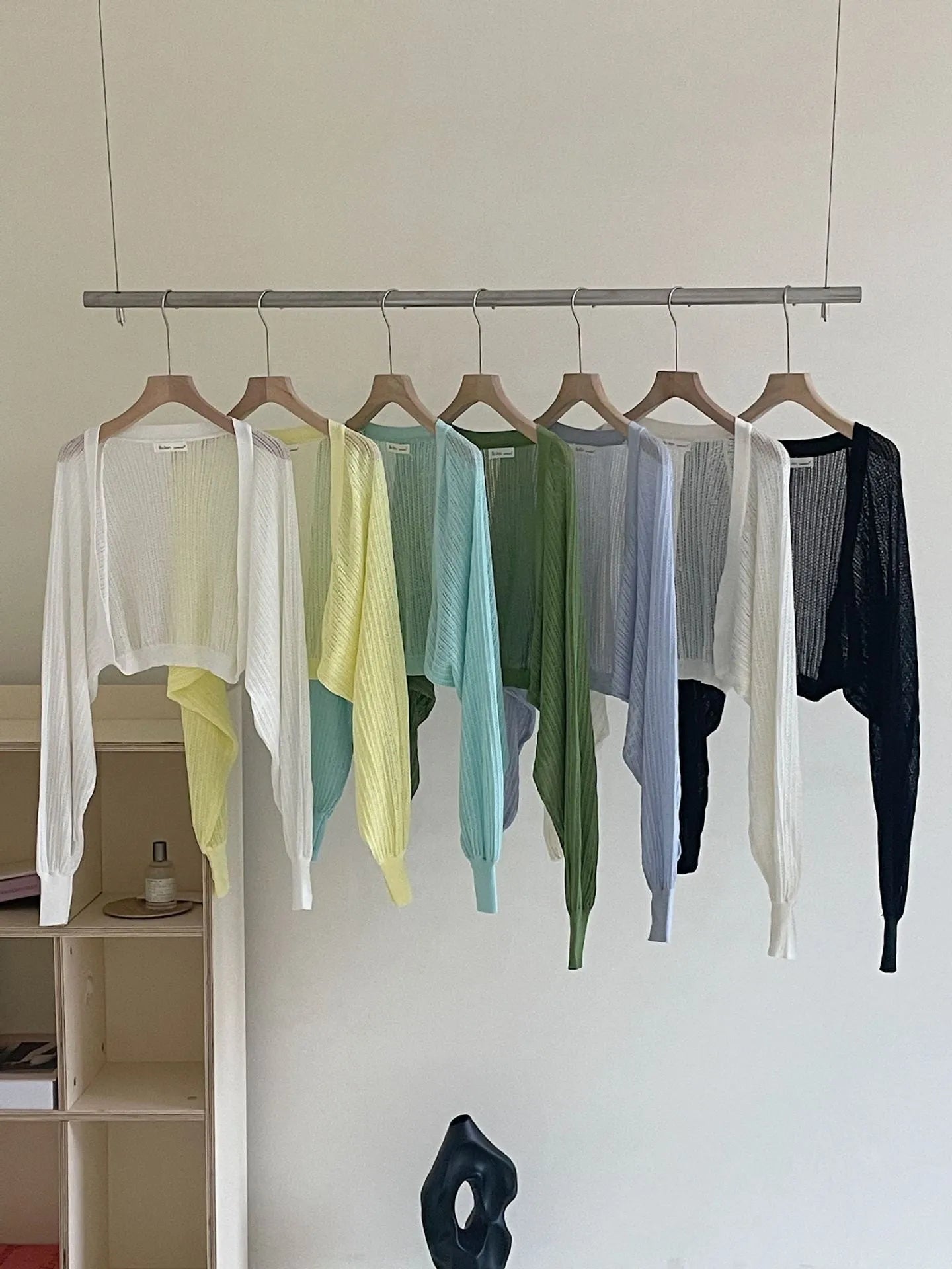 Women's linen blouse with hollow-out design and long lantern sleeves in apricot colour