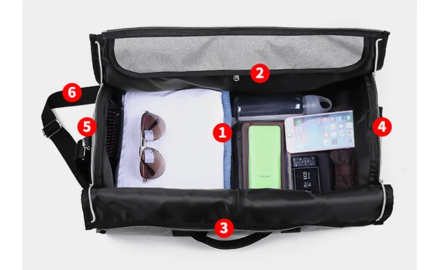 Medium cylinder travel bag in Oxford cloth, shown in black, with zipper open to reveal internal pocket.