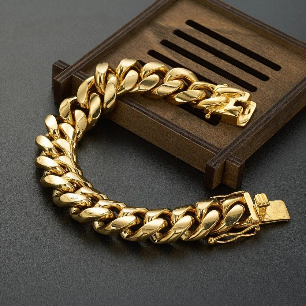 Gold stainless steel Miami Cuban link chain 12mm width on a white background
