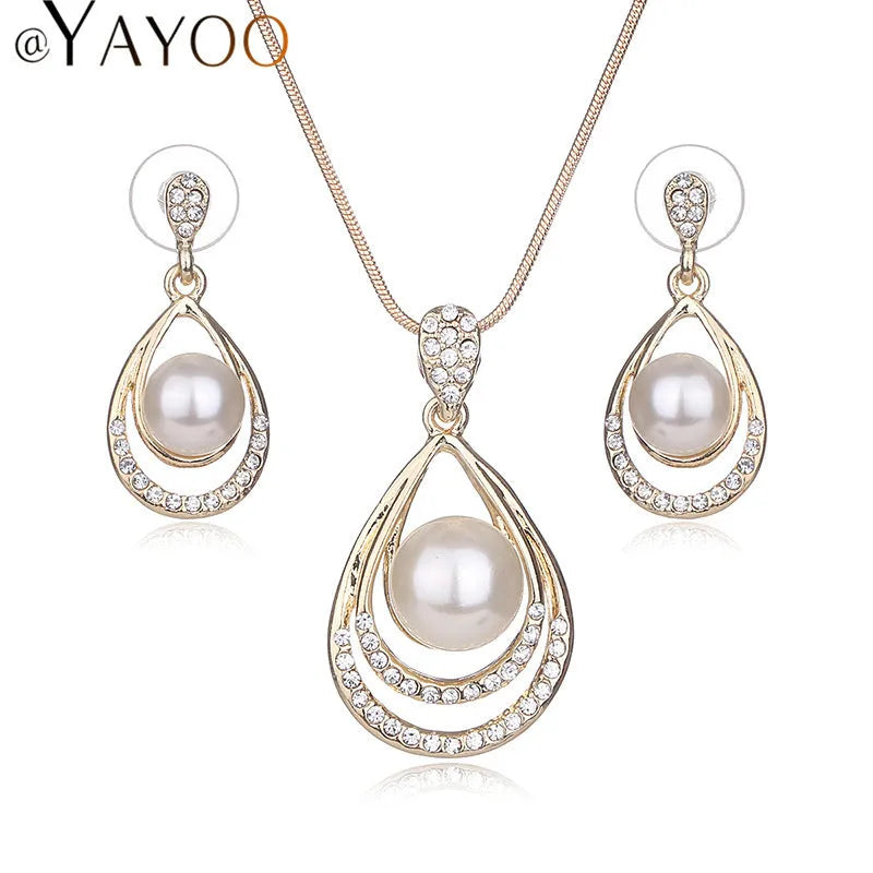 Women's fashion pearl jewelry set with drop-shaped simulated pearl necklace and earrings in silvery colour