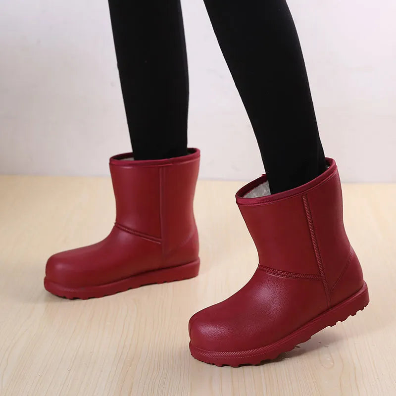 Women's mid-calf EVA waterproof snow boots with velvet lining, platform heel, round toe, in black