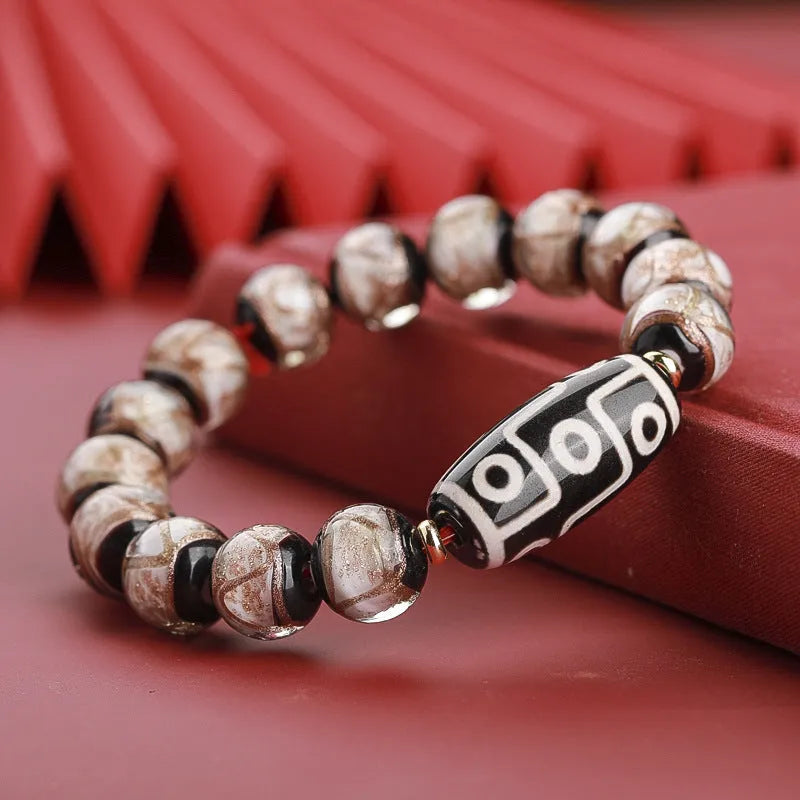 Coloured glaze Chinese style bracelet with snake beads, available in 10mm, 12mm, or 14mm sizes.