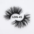 25MM3D handmade mink eyelashes in a clear plastic tray showing 25mm length 3D curl design