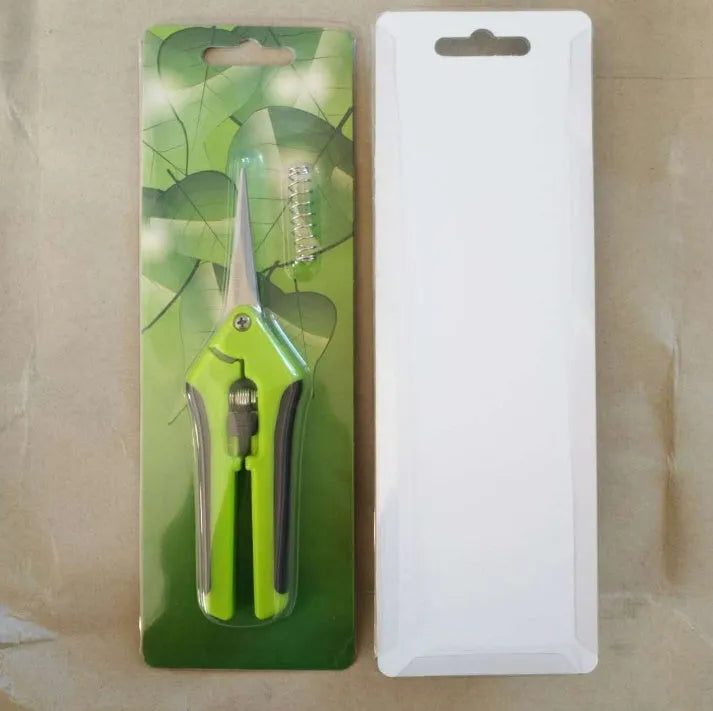 Pair of green stainless steel pruning gardening scissors 16.5 cm long on white background