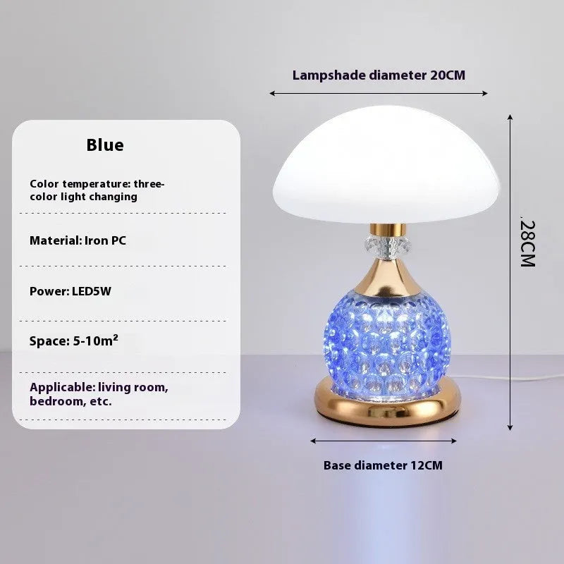 Light luxury mushroom table lamp with carved base in transparent colour on a wooden bedside table