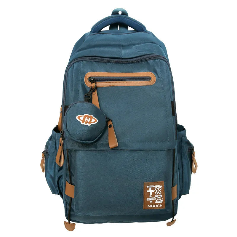 Large capacity nylon backpack for middle school students with curved shoulder straps in multiple colour options