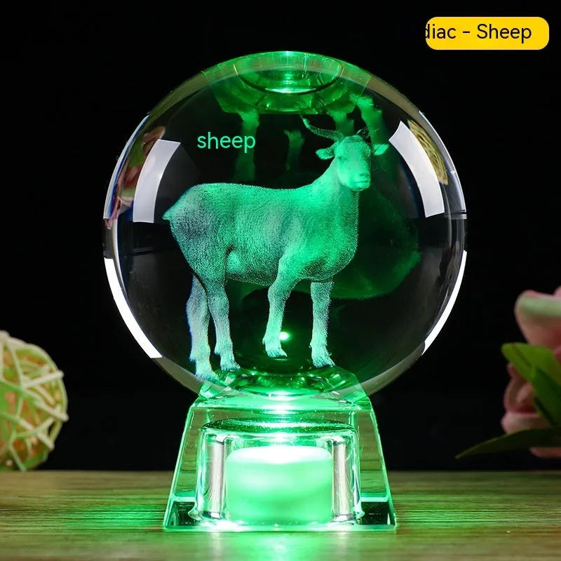 White crystal zodiac decorative ball with electronic base lighting showing Chinese-style animal design