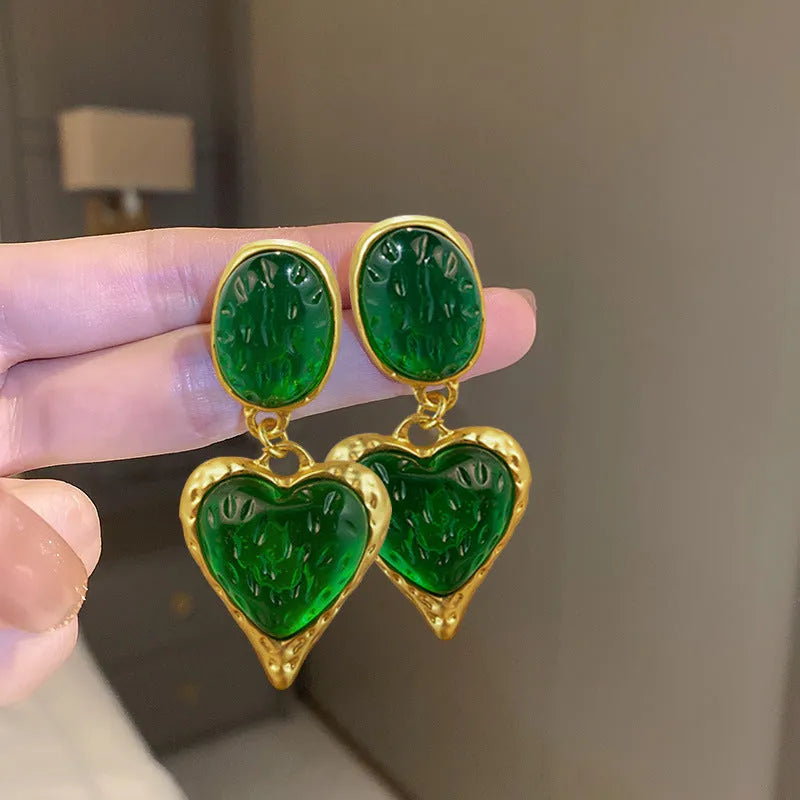 Alloy oval love heart stud earrings with pleated detail in four colour options