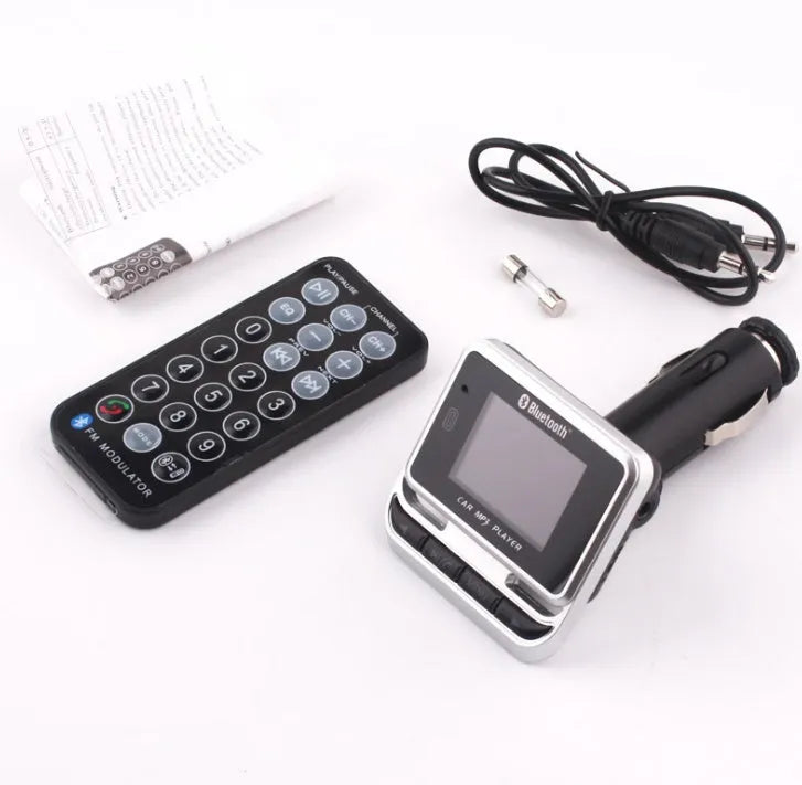 Silver Car Bluetooth MP3 player with monochrome screen and ABS plastic shell for vehicle use