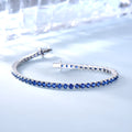 925 sterling silver nano sapphire tennis chain bracelet with drop shape stones on white background
