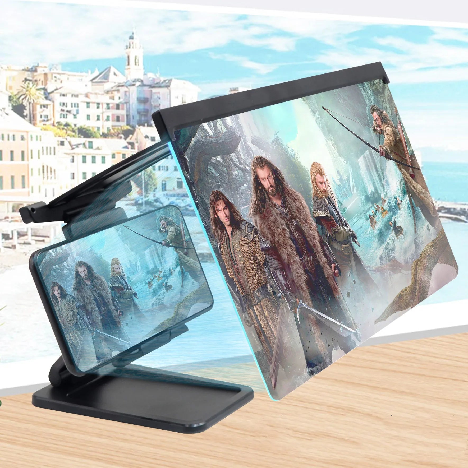 Black L20 mobile phone screen magnifier with 12-inch acrylic lens and folding ABS stand on a table.