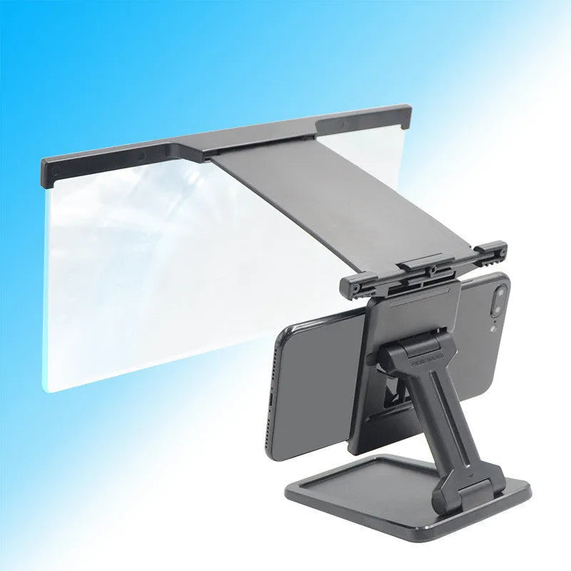 Black L20 mobile phone screen magnifier with 12-inch acrylic lens and folding ABS stand on a table.
