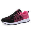 Women's black high-top casual shoes with back lacing and cross bind detail on artificial PU upper.