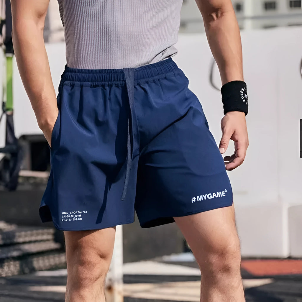 Men's grey fitness training shorts with moisture-wicking quick-dry fabric for workouts