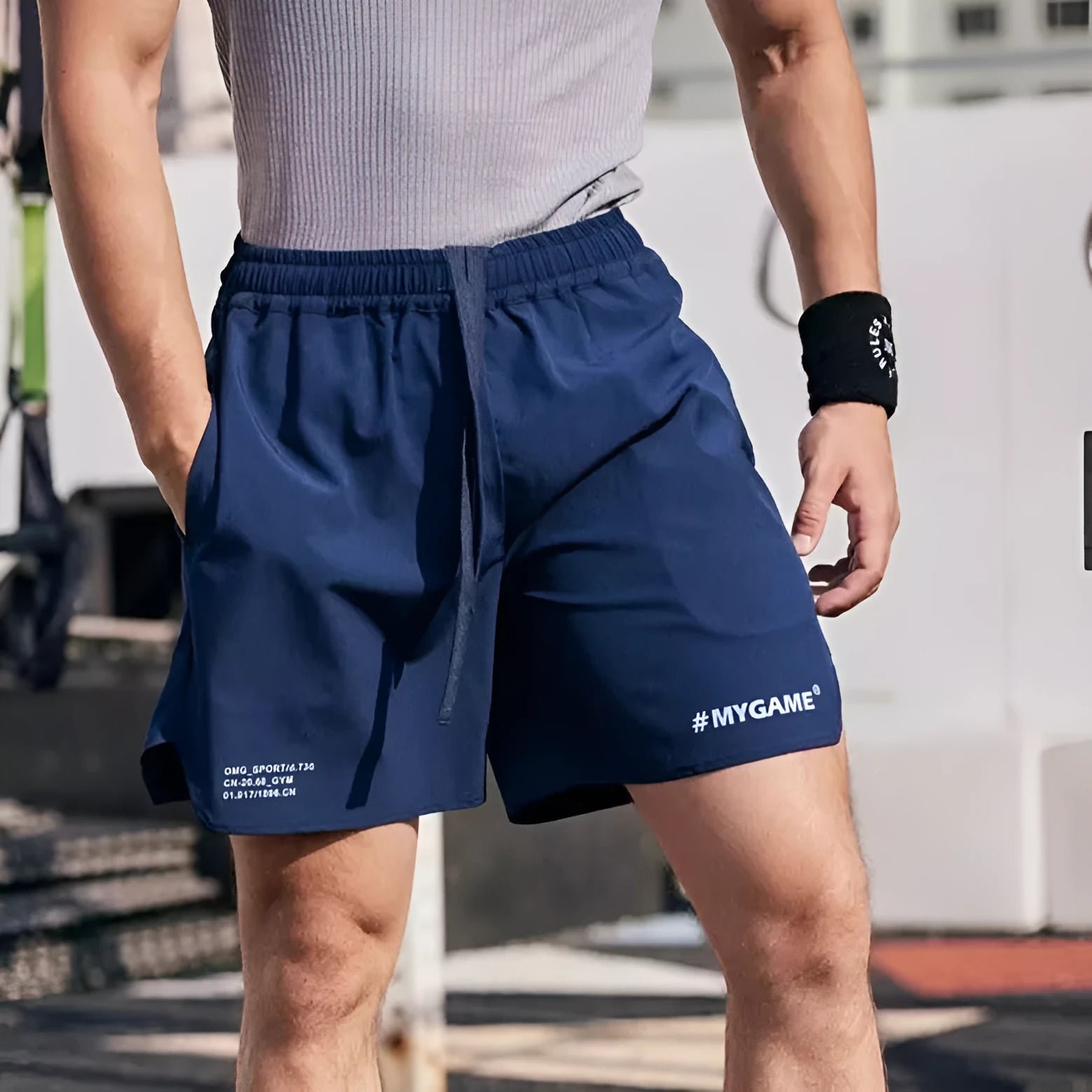 Men's grey fitness training shorts with moisture-wicking quick-dry fabric for workouts