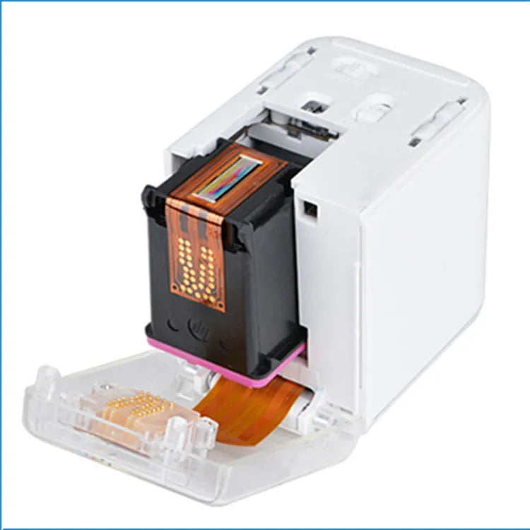 Mbrush portable colour handheld inkjet printer in white, 72x51x68 mm, for industrial marking at 350 metres per minute