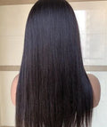 Long straight black high temperature silk wig with long bangs on a mannequin head