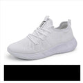 Men's black and white mesh sneakers with lace-up closure and round toe design