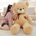 Plush teddy bear ragdoll in light brown with ribbon, 100cm height