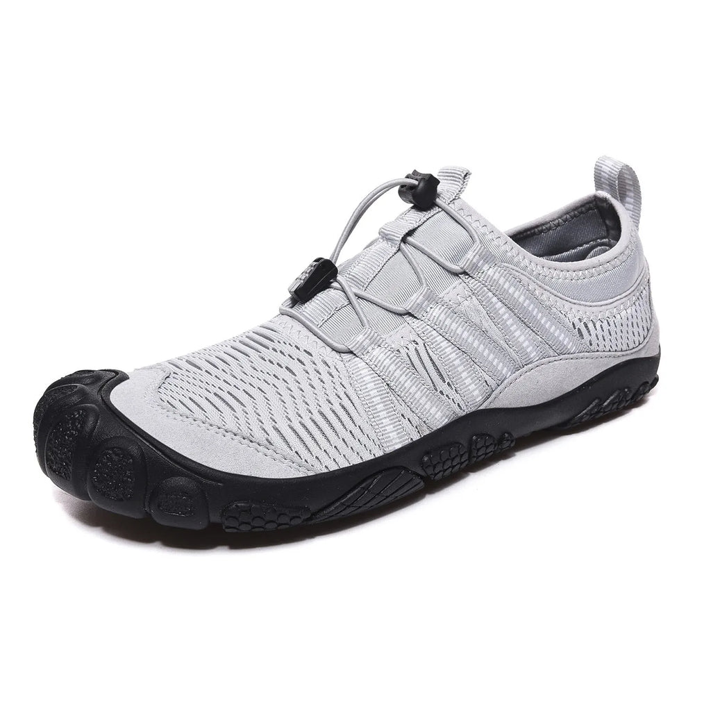 Black unisex low-top wading shoes with elastic band and textured rubber sole for water sports.