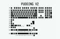White and black PBT doubleshot pudding keycaps with translucent side legends for mechanical keyboards.