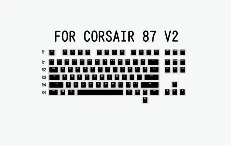 White and black PBT doubleshot pudding keycaps with translucent side legends for mechanical keyboards.